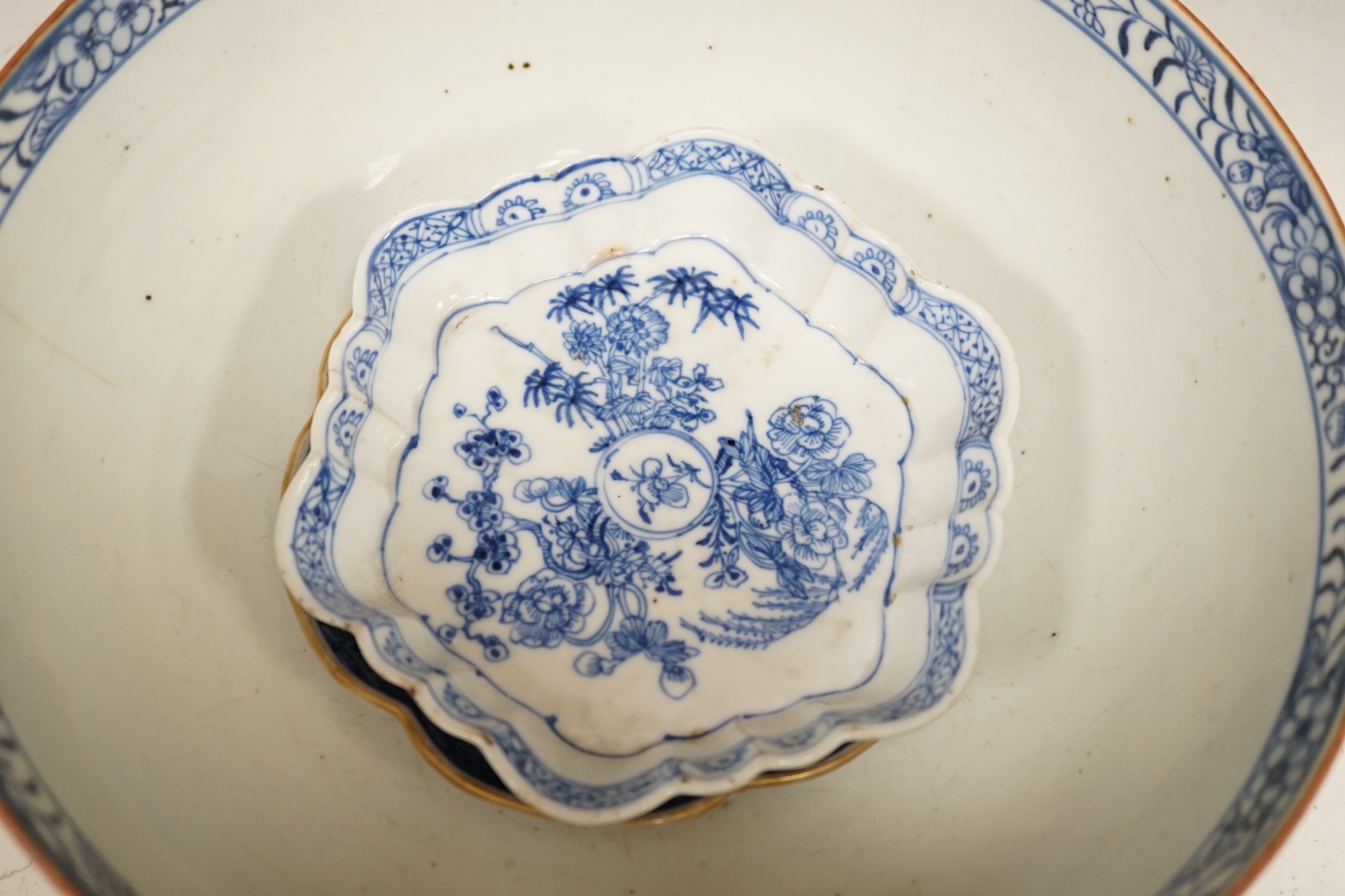 A selection of 18th century blue and white Chinese export bowls and dishes, largest 31cm diameter